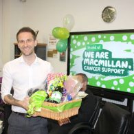 Nick Rose from Midshire accepting first prize for the top bake